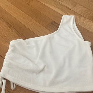 White One sleeve top. sinch side